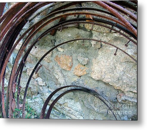 Rust Metal Print featuring the photograph Rusted Rims - Blacksmith Shop - Waterloo Village by Susan Carella