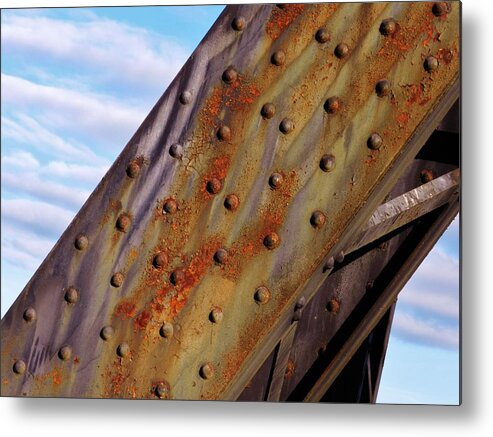 Rust Photographs Metal Print featuring the photograph Soaring Pillar of Rust by Charles Lucas