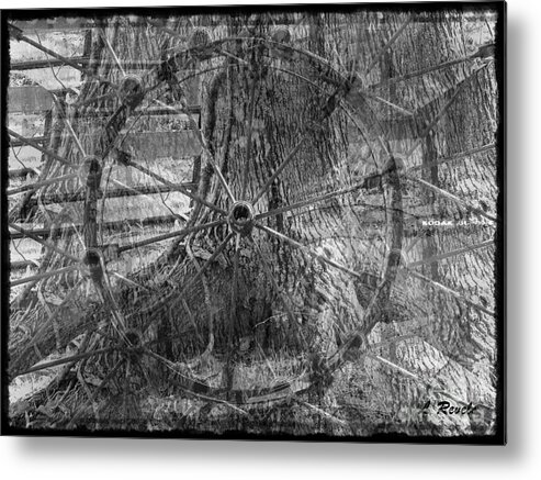 Wheel Metal Print featuring the photograph Photos In An Attic - The Wheel by Leslie Revels