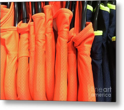 Background Metal Print featuring the photograph Colourful sports tops #1 by Tom Gowanlock
