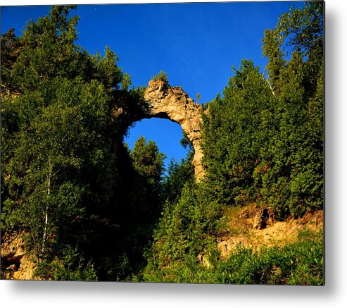 Mackinac Island Metal Print featuring the photograph Beneath Arch Rock by Keith Stokes