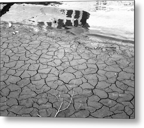 Barren Land With Cracks Metal Print featuring the photograph Barren dry land by Vineta Marinovic