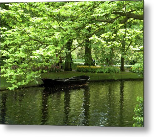 Boat Metal Print featuring the photograph Boat on a lake by Manuela Constantin