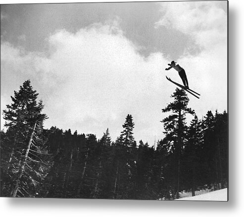 1 Person Metal Print featuring the photograph Champion Ski Jumper by Underwood Archives