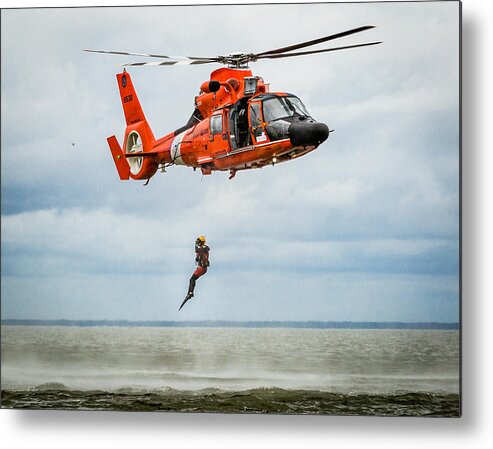Us Coast Guard Metal Print featuring the photograph Free Falling Rescue Swimmer by Gregory Daley MPSA