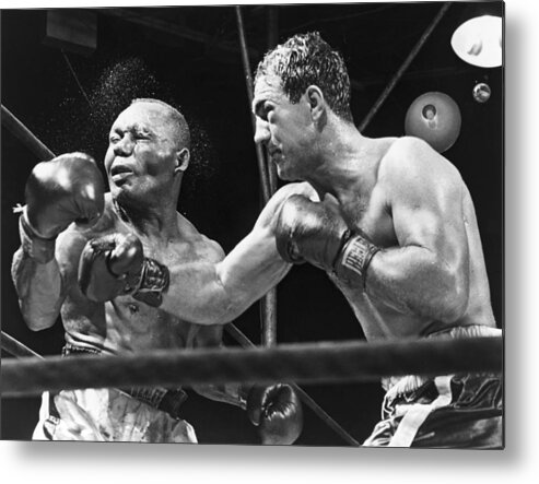 History Metal Print featuring the photograph Rocky Marciano Landing A Punch by Everett