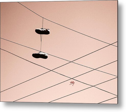 Abstract Metal Print featuring the photograph Shoes on a wire by Linda Hollis