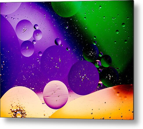 Oil And Water Image Macro Closeup Purple Green Space Metal Print featuring the photograph The far Side Moons by Bruce Pritchett