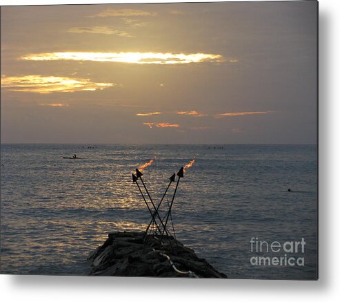 Tiki Torches On The Waters Edge In Waikiki Metal Print featuring the photograph Tiki Torches in the Sunset by Anthony Trillo