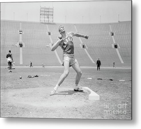 People Metal Print featuring the photograph Bill Nieder Holding A Shotput by Bettmann