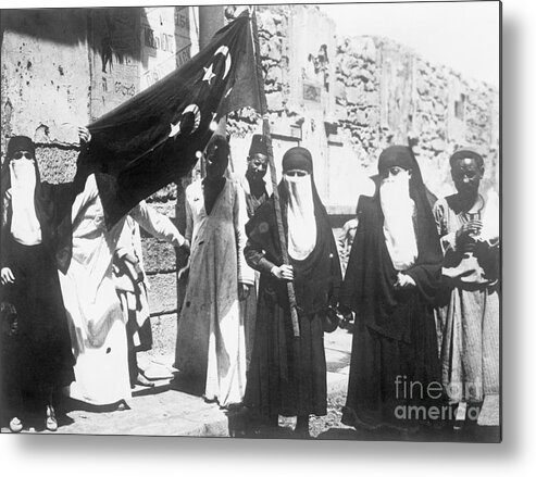 People Metal Print featuring the photograph Egyptian Suffragists Displaying Flag by Bettmann