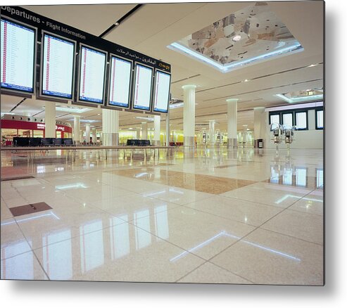 Airport Departure Area Metal Print featuring the photograph Flight Information Displays At Dubai by Eschcollection