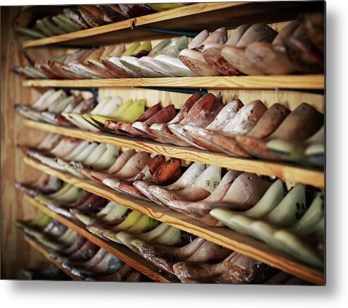 Care Metal Print featuring the photograph Shelves Of Boot Lasts On Wall In Boot by Thomas Barwick