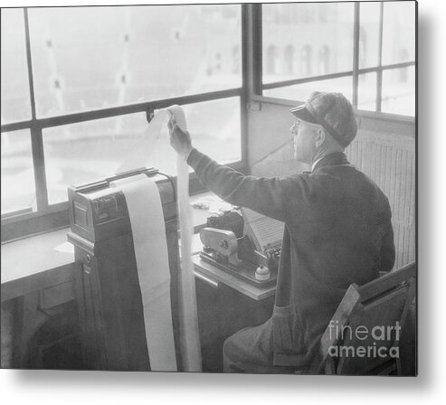 People Metal Print featuring the photograph William Henne Using Teletype Machine by Bettmann