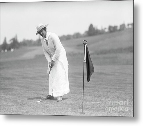 People Metal Print featuring the photograph Wman Playing Golf by Bettmann