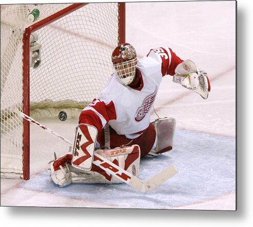 Toughness Metal Print featuring the photograph 2007 NHL Playoffs - Game Six - San Jose Sharks vs Detroit Red Wings by John Medina