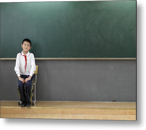8-9 Years Metal Print featuring the photograph A portrait of a schoolboy. by xPACIFICA
