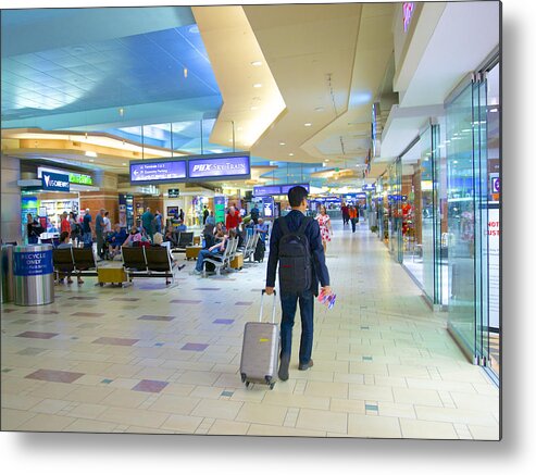 People Metal Print featuring the photograph Business traveller with roller bag moving through airport terminal, Phoenix, AZ by Barry Winiker