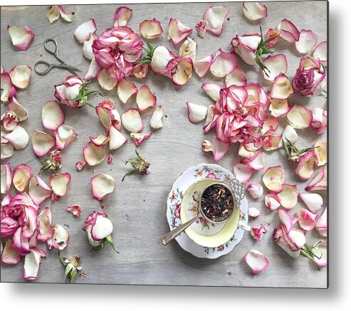 Large Group Of Objects Metal Print featuring the photograph Rose petals and a cup of tea by JuliaK