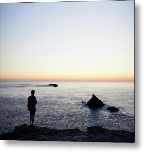 Tranquility Metal Print featuring the photograph Hiker Looking Out To Sea by Dougal Waters