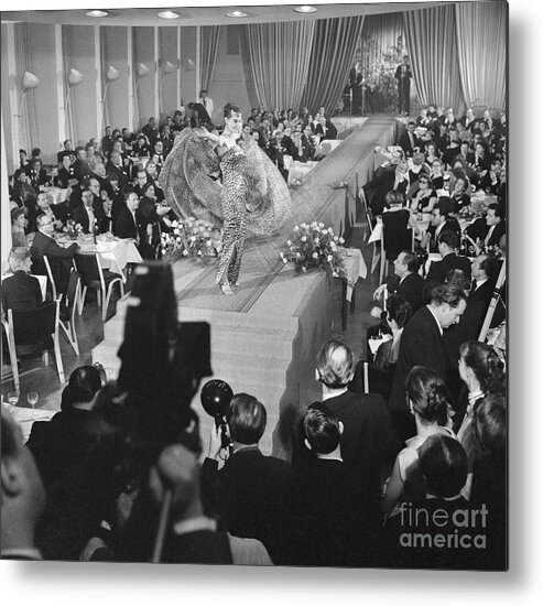 Mid Adult Women Metal Print featuring the photograph Fashion Model On Runway Wearing H.w by Bettmann