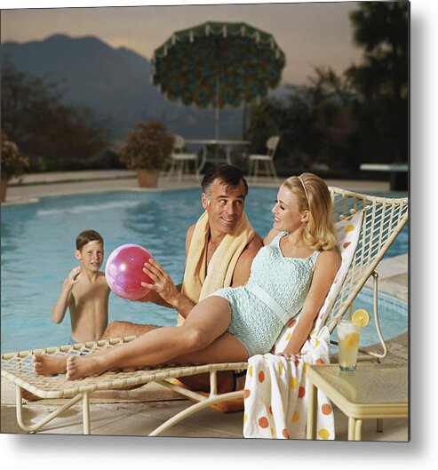 Mid Adult Women Metal Print featuring the photograph Father And Son Playing With Beach Ball by Tom Kelley Archive