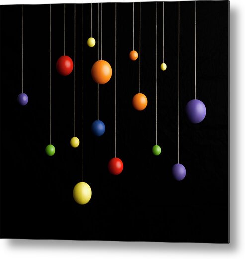Hanging Metal Print featuring the photograph Spheres Hanging On Strings by Jeffrey Coolidge
