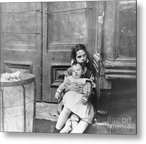 Toddler Metal Print featuring the photograph Girl Sitting On Doorstep With Baby by Bettmann