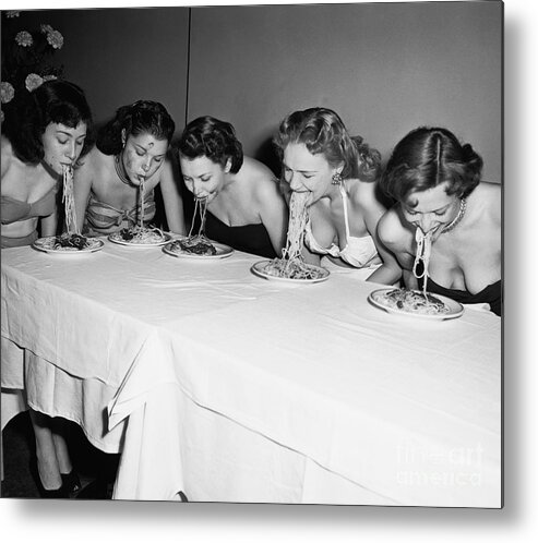 Child Metal Print featuring the photograph Women In A Spaghetti Eating Contest by Bettmann