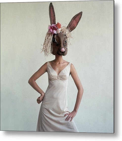 Fashion Metal Print featuring the photograph A Woman Wearing A Rabbit Mask by Gianni Penati