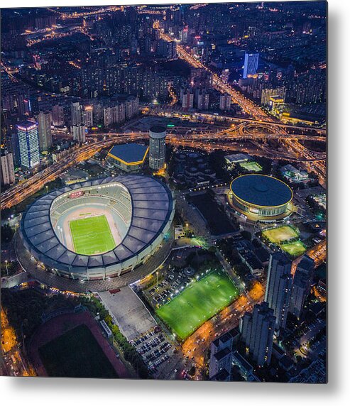 Emergence Metal Print featuring the photograph aerial view of Shanghai stadium in Xuhui district by Danny Hu