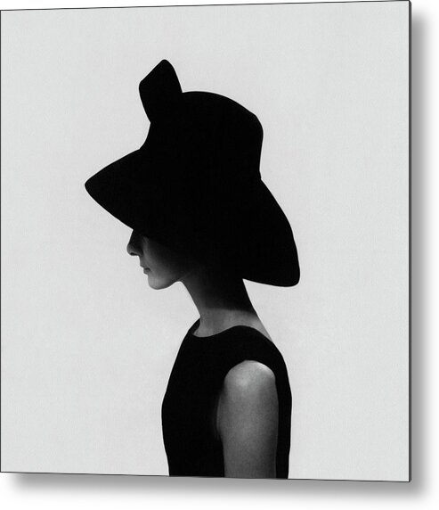 Accessories Actress Beauty Fashion Hat Model Personality Society Studio Shot One Person People Headgear Side View Audrey Hepburn 1960s Style Givenchy Head And Shoulders 35-39 Years Mid-adult 30s Adult Female Mid Adult Woman Velvet Shadow #condenastvoguephotograph August 15th 1964 Metal Print featuring the photograph Audrey Hepburn Wearing A Givenchy Hat by Cecil Beaton