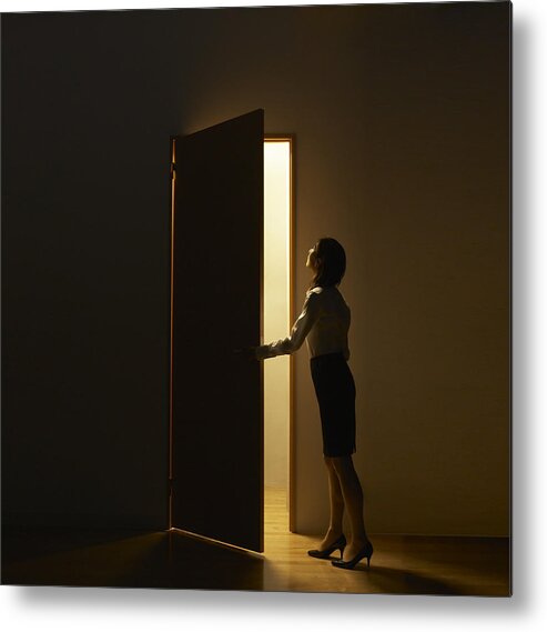 People Metal Print featuring the photograph Business Woman Opening Door Standing In Light by D-base