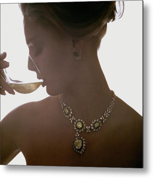 Jewelry Metal Print featuring the photograph Close Up Of A Young Woman Wearing Jewelry by Bert Stern