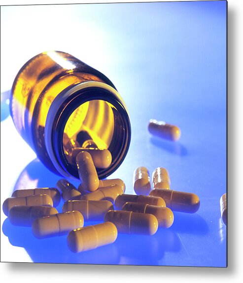 Drugs Metal Print featuring the photograph Drug Capsules by Cc Studio/science Photo Library