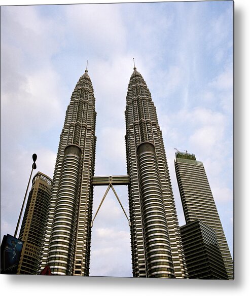 Petronas Towers Metal Print featuring the photograph Evocative Petronas Towers by Shaun Higson