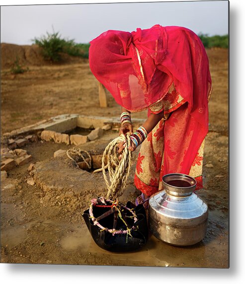 Working Metal Print featuring the photograph Indian Woman Getting Water From The by Hadynyah