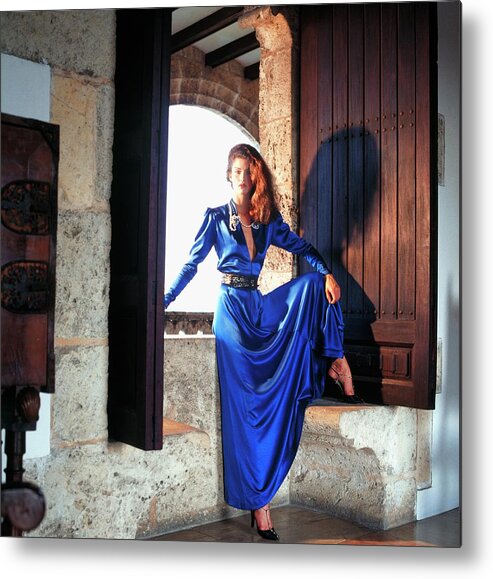 Santo Domingo Metal Print featuring the photograph Janice Dickinson Wearing Blue Dress by Horst P. Horst
