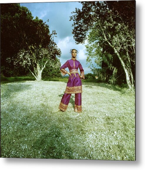 Actress Metal Print featuring the photograph Marisa Berenson Wearing A Purple Ensemble by Arnaud de Rosnay