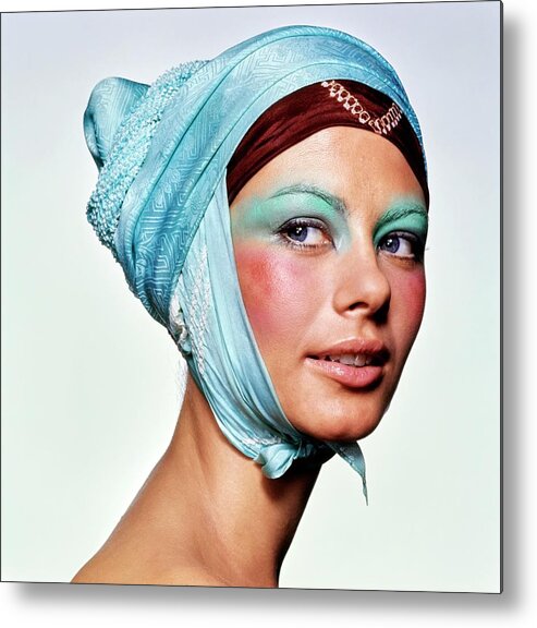 Beauty Metal Print featuring the photograph Model Wearing A Blue Headscarf by Bert Stern