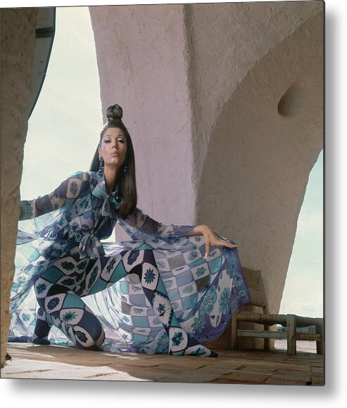 Fashion Metal Print featuring the photograph Model Wearing A Chiffon Voile Coat by Henry Clarke
