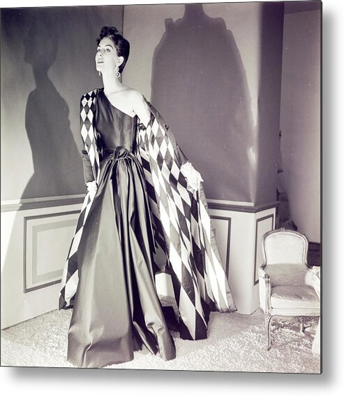 Indoors Metal Print featuring the photograph Model Wearing A Jane Derby Coat And Dress by Horst P. Horst