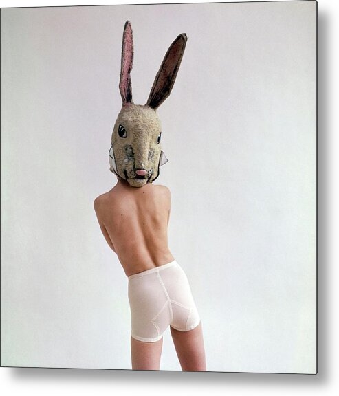 Animal Metal Print featuring the photograph Model Wearing A Rabbit Mask by Gianni Penati