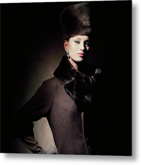 Studio Shot Metal Print featuring the photograph Model Wearing Fur Fez And Collar by Horst P. Horst