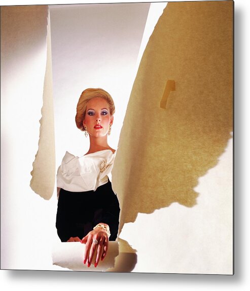 Studio Shot Metal Print featuring the photograph Model Wearing Satin Collar Behind Ripped Paper by Horst P. Horst