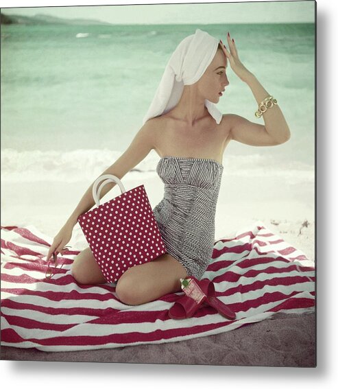 Fashion Metal Print featuring the photograph Model With A Polka Dot Bag On A Beach by Roger Prigent