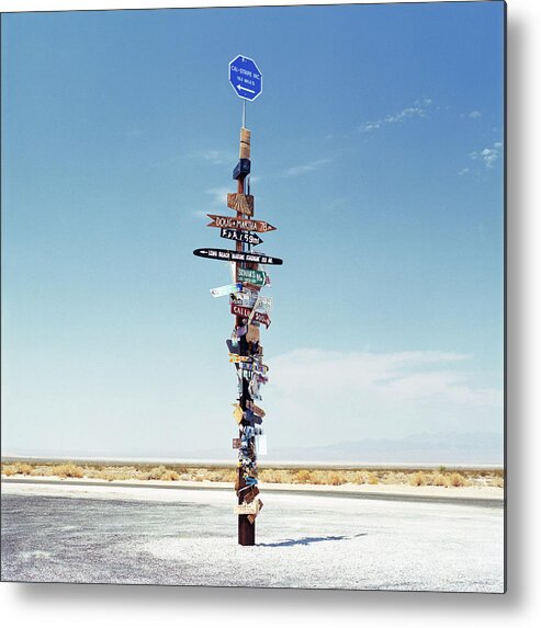 Tranquility Metal Print featuring the photograph Sign Post In The Desert by Gary Yeowell