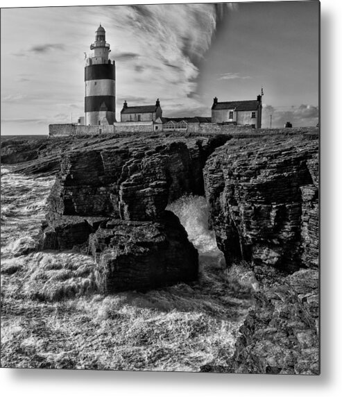 Hook Metal Print featuring the photograph Stormy day at Hook Head Lighthouse by Nigel R Bell
