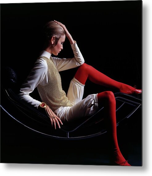 Accessories Metal Print featuring the photograph Twiggy Sitting On A Modern Chair by Bert Stern