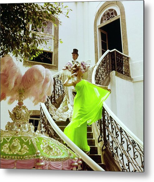 Fashion Metal Print featuring the photograph Veruschka Wearing A Malcolm Starr Dress by Henry Clarke